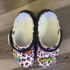 Women’s size 7 party animal  platform crocs with  6 Charms